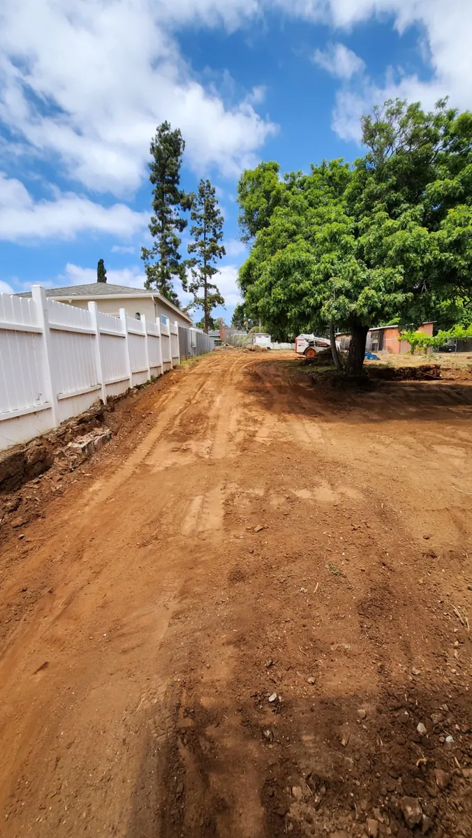 Rough graded backyard access corridor for proposed ADU driveway, prior founder-performed work